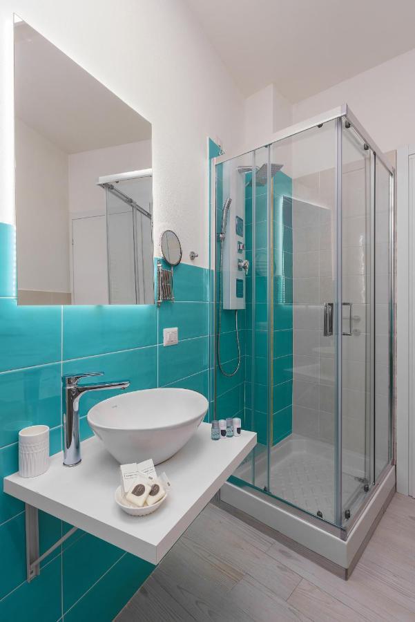 Atena Rooms Cagliari Bagian luar foto